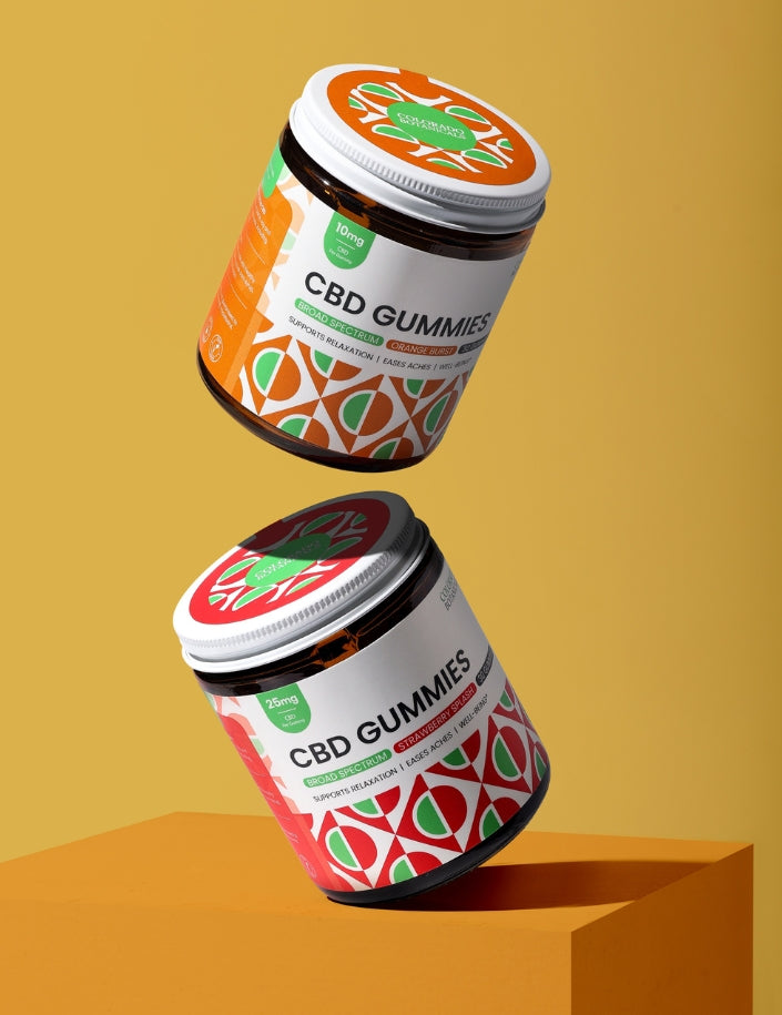 Colorado Botanicals CBD Gummies Orange and Strawberry Flavor floating in the air